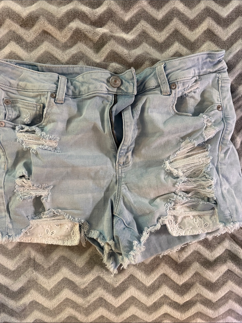 American Eagle Outfitters Light Wash Distressed Denim Shorts with Lace